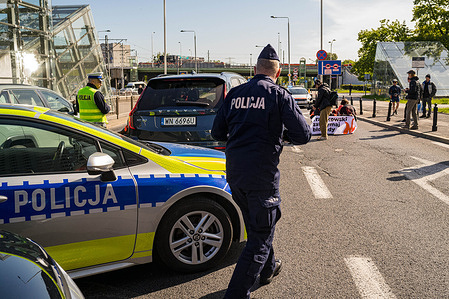 The Polish police arrive on site at a road blockade by the climate activist group, The Last Generation. A collection of photographs of the Polish police at assorted protests and rallies.