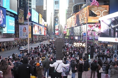 People are seen in Times Square, Manhattan, New York City.