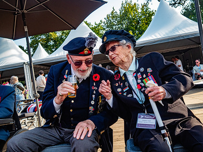 WWII veterans seen talking to each other. This march is the world’s biggest one-day memorial walking tour. This year, with a record number of 36,343 participants which is also in remembrance of the Battle of Arnhem in 1944. At the finish line as every year, British veterans who fought for Dutch freedom in World War II were present.