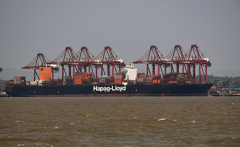 Hapag-Lloyd container vessel is seen anchored at the Jawaharlal Nehru Port Authority (JNPA) in Navi Mumbai. Jawaharlal Nehru Port Authority (JNPA) also known as Nhava Sheva Port is one of India's largest container port situated on the eastern shore of Mumbai harbour along the Arabian sea. It handles 50% of the cargo volume across the major ports in the country.