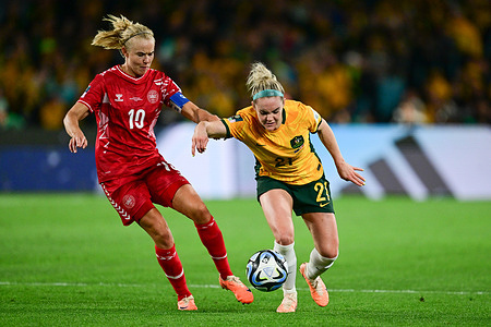Pernille Mosegaard Harder (L) of the Denmark women soccer team and Ellie Madison Carpenter (R) of the Australia women soccer team seen in action during the FIFA Women's World Cup 2023 match between Australia and Denmark at Stadium Australia. Final score; Australia 2:0 Denmark.