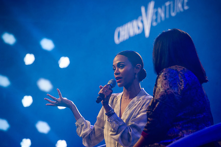 American actress Zoe Saldana is seen giving a talk during the Chivas Venture Final. The 14th edition of the TNW (The Next Web) conference was inaugurated in Amsterdam at the NDSM, a creative hub for artists and entrepreneurs. Every year, this global competition gives $1 million in no-strings funding to social entrepreneurs who blend profit with purpose. The judging panel included Zoe Saldana, the Avatar and Avengers star has significant experience in business and philanthropy. As the founder of digital media platform BESE, which aims to celebrate diverse cultures and combat their lack of representation in mainstream media, Saldana works to shine a light on underrepresented communities. The actress and activist was also the ambassador for the ‘Lend A Hand’ campaign, which works to help impoverished women build their own businesses.