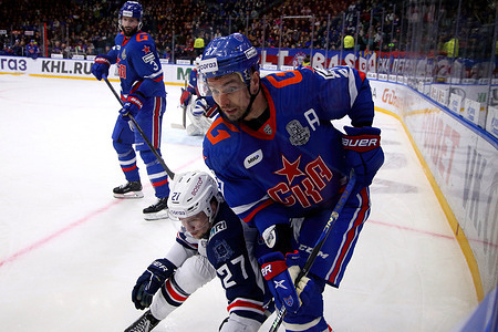 SKA Hockey Club player, Igor Ozhiganov (No.27) and Torpedo Hockey Club player, Sergei Goncharuk (No.27) seen in action during the Kontinental Hockey League, Gagarin Cup, match 1, 1/2 finals of the Western Conference season KHL 2022 - 2023 between SKA Saint Petersburg and Torpedo Nizhny Novgorod at the Ice Sports Palace.
(Final score; SKA Saint Petersburg 2:1 Torpedo Nizhny Novgorod)