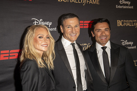 (L-R) Kelly Ripa, Michael Gelman and Mark Consuelos attend the Broadcasting + Cable Hall Of Fame Awards 33rd Anniversary Gala at The Ziegfeld Ballroom on September 30, 2025 in New York City.
