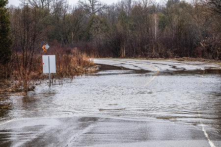 The Speed River overflows its banks onto Blackbridge Road. In early April 2025, west of the Greater Toronto Area, the Kitchener, Waterloo, and Cambridge areas experienced significant flooding following a mixed precipitation event resulting in approximately 40 to 80 millimeters of total precipitation. Flood warnings were issued for these cities as the Grand River overflowed its banks, affecting low-lying areas and prompting road and park closures. In Cambridge, Water Street South and Blackbridge Road sections were closed due to high water levels, and Riverside Park experienced substantial flooding.