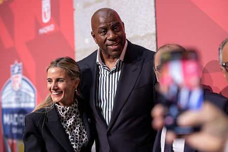 Earvin "Magic" Johnson poses at the NFL welcome event in Madrid. The Community of Madrid received representatives of the National Football League (NFL), the American football league, at the Royal Post Office, the seat of the regional government, on the occasion of the game that will pit the Miami Dolphins against the Washington Commanders this Sunday at the Santiago Bernabéu stadium in the Spanish capital.