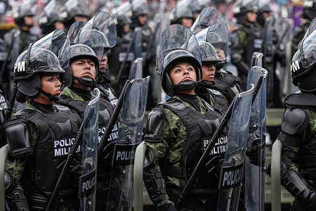 Members of the Marine Corps and Soldiers march during a military parade in the main streets of Mexico city to celebrate the Independence day.
