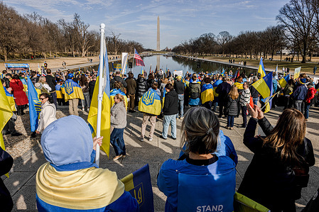 Activists participate in a rally marking the fourth anniversary of Russia's war on Ukraine at the Lincoln Memorial.