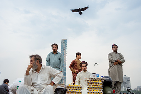 Afghan Muslims buy yellow eggs during the Eid al-Fitr celebration. Every year, Muslims from Afghan community of Kolkata, India, visit Maidan (a famous place in Kolkata) with their friends and family members to share their joy as the country celebrates Eid al-Fitr, which marks the end of the holy fasting month of Ramadan.