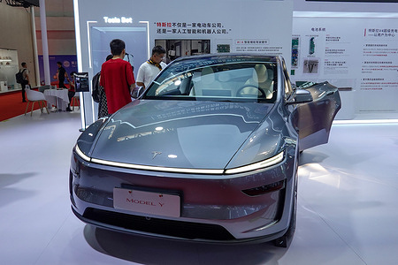 A silver Tesla Model Y seen on display at the 3rd China International Supply Chain Expo. The third edition of the Third China International Supply Chain Expo (CISCE) has brought together more than 650 companies and institutions from 75 countries and regions. And the organiser of the expo is China Council for the Promotion of International Trade.