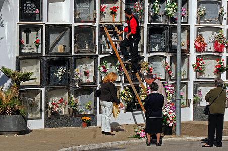 Municipal Cemetery of L'Hospitalet City where some relatives put flowers in the grave of a relative.
Spain celebrates the day of the dead where family and friends visit the cemeteries where their deceased relatives rest.
