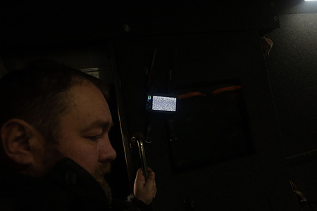 A drone detector from the White Angels police group picks up a signal during an evacuation of civilians from the village of Krasnopillya. Rescue missions, especially in frontline areas, are carried out by this police team, which is equipped with technology to detect Russian FPV (First Person View) drones and with weapons to shoot them down.