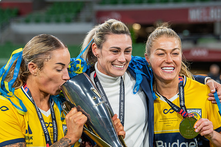 Brooke Nunn (L), coach Emily Husband (C) and Sarah Rowe (R) of the Central Coast Mariners seen celebrating during the A-League Women Grand Finale between Central Coast Mariners and Melbourne Victory at AAMI Park. The Grand Finale has been decided by a penalty shootout with a victory for the Central Coast Mariners.