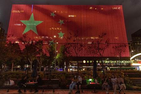 A huge screen showing Chinese flag beside Victoria Harbour, during the anniversary.
Despite the COVID-19 pandemic, and China's National Security Law crackdown on Hong Kong democratic movement, numerous Chinese propaganda signs were put all over the city, as the Chinese Communist Party celebrates its 100th anniversary.