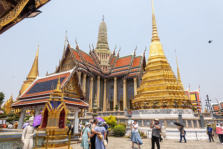 Tourists and locals visit The Grand Palace a stunning complex of historic buildings. The Grand Palace built in 1782 during King Rama I’s reign as the official residence of Thai kings has evolved over the centuries into a symbol of Thailand's royal heritage, housing the revered Temple of the Emerald Buddha while blending traditional Thai and Western architectural influences.