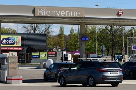 Cars seen parking at Carrefour Group gas station. Car and fuel inflation at petrol station during school holidays in the town of Salaise.