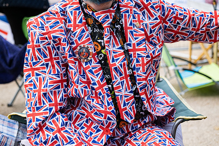 A Royal supporter camps along The Mall and sets up decorations to celebrate the Coronation. The decorations and facilities in Buckingham Palace are set for the Coronation of King Charles III on 6 May 2023. Along The Mall, Royal supporters camps for days in order to secure a good view of the procession.