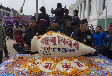 A yomari being displayed by people of Newar community during the festival.
Yomari Punhi is a Newari festival marking the end of the rice harvest. It takes place in November/December during the full moon day of Thinlā, the second month in the lunar Nepal Era calendar.