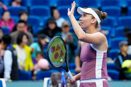 Elise Mertens of Belgium celebrates victory over Coco Gauff (not in view) of the United States during the Women's Singles Round of 16 match on day eight of the China Open at the National Tennis Center. Elise Mertens defeats Coco Gauff 6-3, 6-3 in the Round of 16 at the China Open in Beijing.