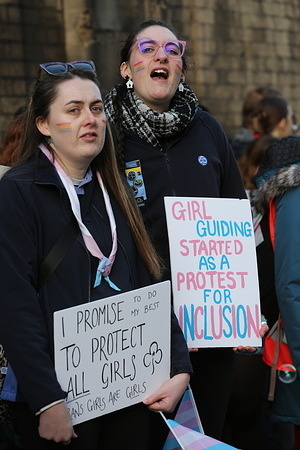 A protester holds a placard saying ’I Promise To Do My Best To Support All Girls’ during the protest. Protesters gather to oppose the new member rule in Girlguiding. Following the recent Supreme Court ruling has impacted the interpretation of trans rights in certain single sex organisations like Girlguiding. New members have to be recorded as female at birth and trans girls and young women will no longer to join Girlguiding as new youth members.