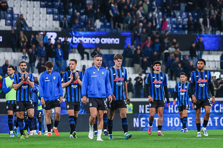 Atalanta BC players leave the pitch at the end of the match during Coppa Italia 2025/26 Semi-Finals 2nd Leg football match between Atalanta BC and SS Lazio at New Balance Arena. Final score; SS Lazio defeated Atalanta BC 2 -1 in penalty shoot out.