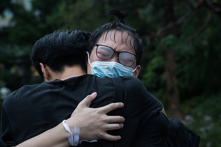 A protester cries as another protester embraces him during the demonstration.
Thousands of Hong Kong educators came together in support of their students and emphasised the need to protect Hong Kong's youth. Many Hong Kong students have been active participants in the often violent anti-extradition protests that have taken place over the past few months.