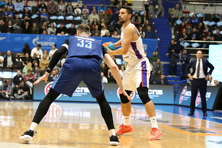 Anton Astapkovich (8) of CSKA and Andrey Vorontsevich (33) of Zenit in action during the VTB United League basketball match, Regular Season, between Zenit Saint Petersburg and CSKA Moscow at "kck Arena". Final score; Zenit 84:85 CSKA Moscow.