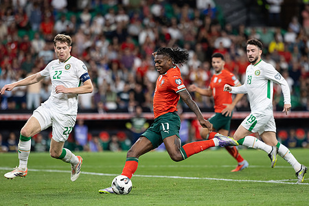 Rafael Leao of Portugal seen in action with Nathan Collins and Mikey Johnston during the FIFA World Cup 2026 qualifier match between Portugal and Republic of Ireland at Estadio Jose Alvalade. Final score Portugal 1 : 0 Republic of Ireland