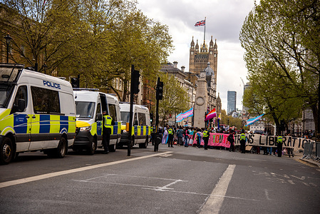 The Metropolitan Police stand on guard during the Trans Rights Counter-Protest on Whitehall in support of Trans Rights amid “199 Days Later” March. In response to the "199 Days Later" march in Westminster, trans rights activists organized a counter-protest to challenge perceived discrimination and defend gender identity protections amidst the UK's ongoing debate over single-sex spaces.