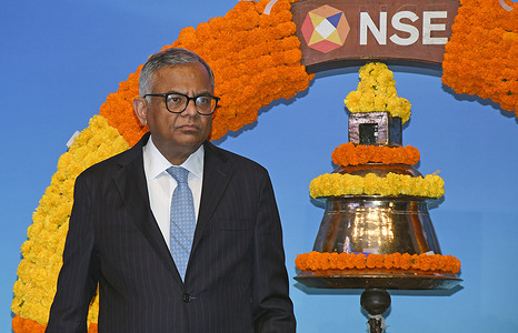Natarajan Chandrasekaran, Chairman of Tata Sons is seen standing next to a bell during the Initial Public Offer (IPO) listing ceremony at the National Stock Exchange (NSE) in Mumbai.