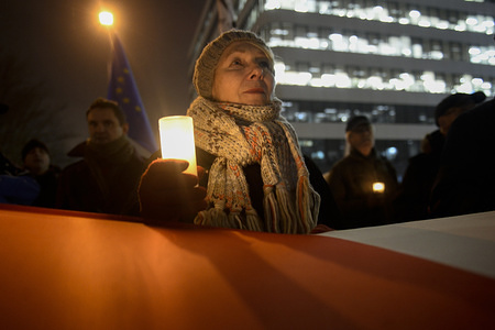 A woman holds a candle during a protest against judicial reforms in front of Krakow Court.
Polish citizens held demonstrations against the ruling government judicial reforms, which would give greater control over the courts and the national election commission.