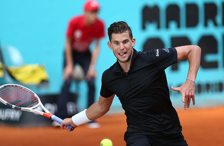 Dominic Thiem of Austria plays forehand against Borna Coric of Croatia in their third round match during day six of the Mutua Madrid Open tennis tournament at the Caja Magica.
(Final Score: Dominic Thiem wins 2-6, 7-6, 6-4)