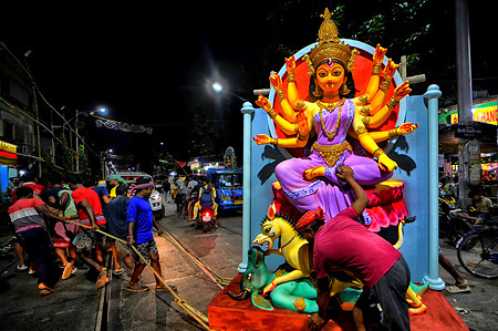Idols of Devi Durga are carried away from the Artist Hub to different Pandals (Temporary Platform for Worshipping of Idols) ahead of the Durga puja, the biggest Hindu Festival. Maa Durga a goddess is worshipped for nine days during the festival which will start from 22 September 2025.