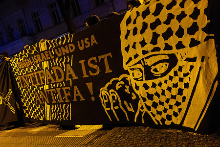 Police officers are present during a demonstration by left-wing groups against the police in the Friedrichshain district. The demonstration took place during the annual anti-police rally in Berlin’s Friedrichshain (often referred to as ACAB Day). Participants were protesting against police practices and law enforcement in general, and part of the demonstration also included pro-Palestinian slogans and messages.