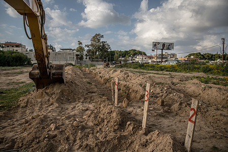 A temporary cemetery has been prepared in the city of Sour to bury people who are killed or die during the war, until it is safe for their families to bring them back to their towns and villages. More than 880 people have been killed since all-out war began again between Israel and Hezbollah on March 2 according to the Lebanese health ministry.