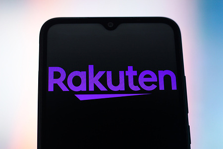 In this photo illustration, the Rakuten logo is seen displayed on a smartphone screen.