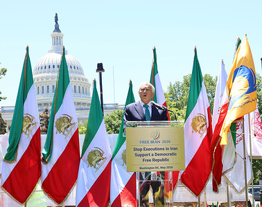 General Wesley Clark, former NATO Supreme Allied Commander Europe, speaks into the microphone at the main lectern, delivering a strategic assessment of the crisis and backing internal resistance against the theocracy. Thousands gathered near the U.S. Capitol for the "Free Iran 2026" rally to protest surging state executions following recent nationwide uprisings. Participants and statesmen systematically rejected all forms of dictatorship—opposing both the former Shah's monarchy and the current mullahs' regime. Backing the National Council of Resistance of Iran (NCRI) coalition and internal Resistance Units, the mobilization endorsed Maryam Rajavi’s Ten-Point Plan as the roadmap to establish a secular, pluralistic, and democratic republic.