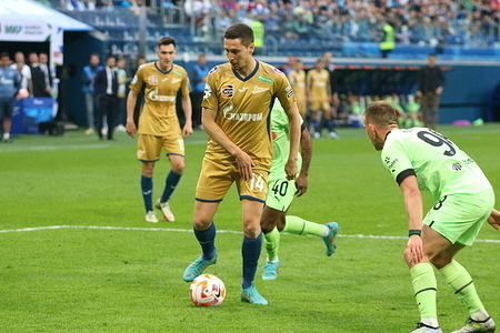 Daler Kuzyaev (No.14) of Zenit in action during the Russian Premier League football match between Zenit Saint Petersburg and Krasnodar at Gazprom Arena. 
Zenit FC team won against Krasnodar with a final score of 2:2. Zenit St. Petersburg will remain at the top of the Russian Premier League.