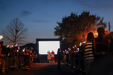 (From L to R) Pope Leo XIV and Cardinal Baldassarre Reina seen during the mass. Pope Leo XIV's penultimate visit to the western quadrant of Rome, to the Church of Santa Maria della Presentación. He was welcomed by a community that, despite the hardships and difficulties of a suburban setting, did not lose hope of redemption. Parish priest, Don Paolo Stacchiotti, said the Pope's arrival was "a great opportunity for a complex neighborhood" where people trust in the Church's presence.