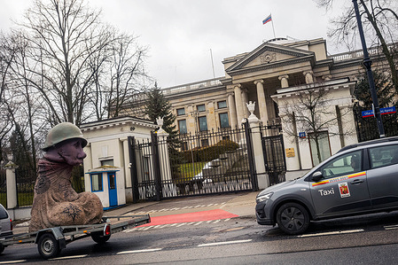 A phallic effigy of Vladimir Putin is driven past the Russian embassy during the demonstration. Ukrainian activists protest the war by driving a phallic effigy of Vladimir Putin past the Embassy of the Russian Federation in Warsaw. The area of Belwederska street where the Russian embassy was symbolically renamed "Aleja Ofiar Rosyjskiej Agresji" or, in English, "Victims of Russian Aggression street" in late 2022.