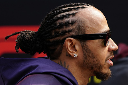 Lewis Hamilton of Great Britain and Scuderia Ferrari on the drivers parade prior to the F1 Grand Prix of China at Shanghai International Circuit.