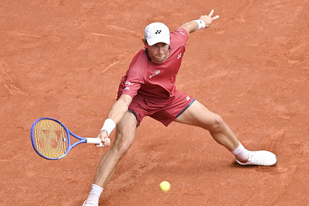 Casper Ruud of Norway plays against Alexander Blockx of Belgium (not in view) during the 2026 Mutua Madrid Open Men's quarter-final match on Day Eleven at La Caja Magica. Victory of Alexander Blockx 6-4, 6-4