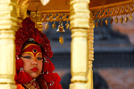 The young Kumari, Trishna Shakya, is carried in a palanquin outside the Kumari’s residence in Kathmandu, Nepal, on Tuesday, September 30, 2025, as Arya Tara Shakya is formally installed as the new Living Goddess. Trishna, stepping down from her sacred role upon reaching maturity, makes way for the two-and-a-half-year-old successor in keeping with centuries-old Newar tradition. The transition marks a rare change in Kathmandu’s Kumari lineage, with Trishna ceremonially retiring upon reaching the age of maturity.