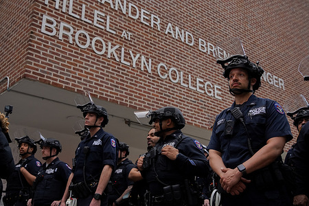 The NYPD Strategic Response Group stand ready after clearing out protestors from their Palestine solidarity encampment on the East Quad at Brooklyn College.