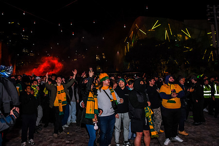 Australian football fans seen during the FIFA World Cup watch party Australia Vs Egypt match at Federation Square. Thousands of fans gathered at Melbourne's Federation Square to watch the FIFA World Cup Round of 32 match on the giant public screen, where Australia was eliminated by Egypt 4–2 on penalties after a 1–1 draw.