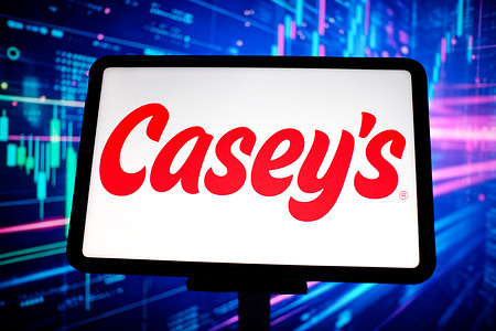 In this photo illustration, the Casey's (Casey's General Stores) logo is displayed on a tablet screen.