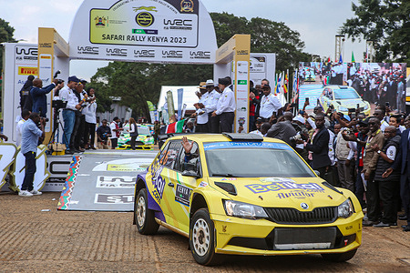 Kenyan driver Carl Tundo and co-driver Jessop Tim driving Škoda Fabia R5 wave to the crowd during the flag-off of the WRC 2023 Safari Rally at the Uhuru Park grounds in Nairobi. The WRC 2023 Safari rally kicked off its 70th year with a flag-off at Nairobi's Uhuru Park and headed to the Kasarani Grounds for the Super Special Stage. The WRC 2023 Safari rally is scheduled to run from Thursday, 22nd June to Sunday, 25th June in Nairobi County, and Naivasha, Nakuru County in Kenya.