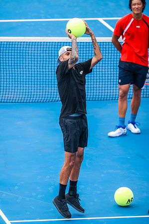 Nick Kyrgios of Australia in a basketball exhibition after beating Zhang Zhizhen of China on Day 1 of the 2026 Kooyong Classic at Kooyong Lawn Tennis Club.
