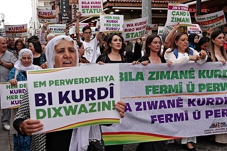 Protesters are seen carrying banners that say "We want education in Kurdish" and "Let Kurdish be the official language" during the march. The Kurdish Language Holiday was celebrated with a march organized by the Mesopotamian Language and Culture Research Association (MED-DER) in Diyarbakir, Turkey. In a press statement issued after the march attended by hundreds of people, the Kurdish language was asked to be granted official status.