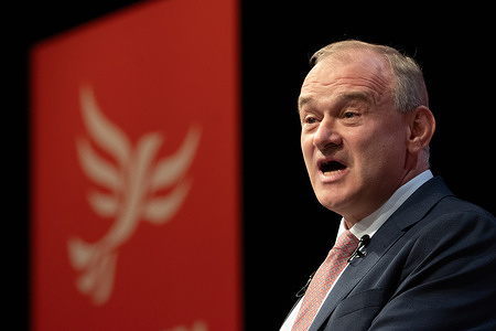 Liberal Democrat leader, Sir Ed Davey addresses party delegates during a headline leaders speech at the Liberal Democrats Autumn Conference. Ed Davey announced a massive tax cut, funded by growing the economy through membership of the EU single market and a customs union. Held at the seaside Brighton Centre on King’s Road, this year's four-day political summit featured designated focus events including a Climate Change Day alongside a Youth and Skills Day.